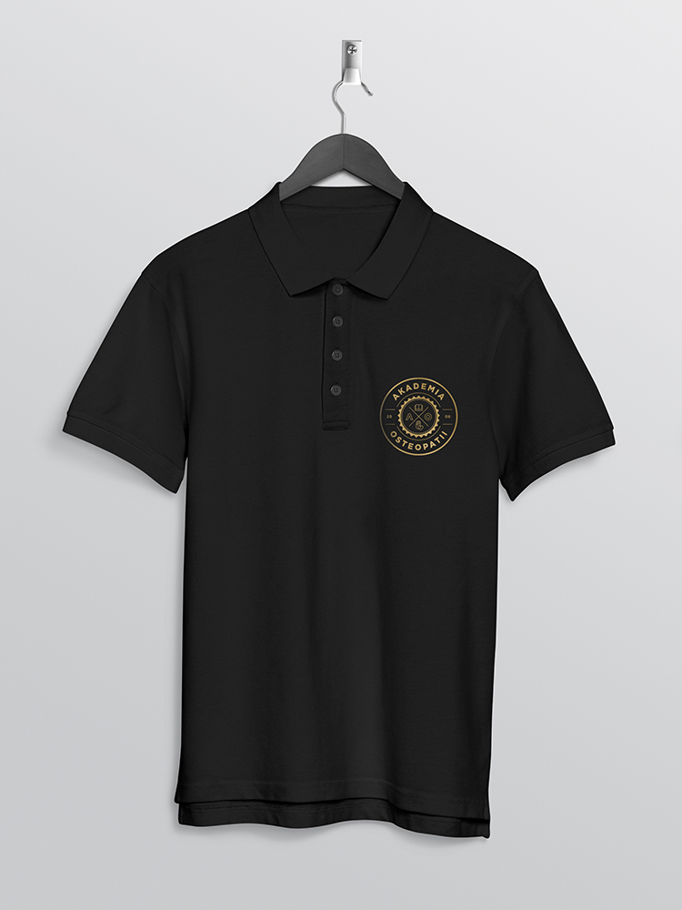 Front back of black plain polo t shirt hanging on wall